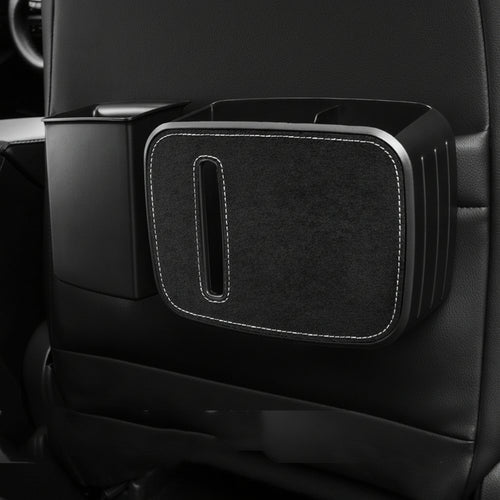 Car seat organizer with cup holder and storage space on a black car interior.